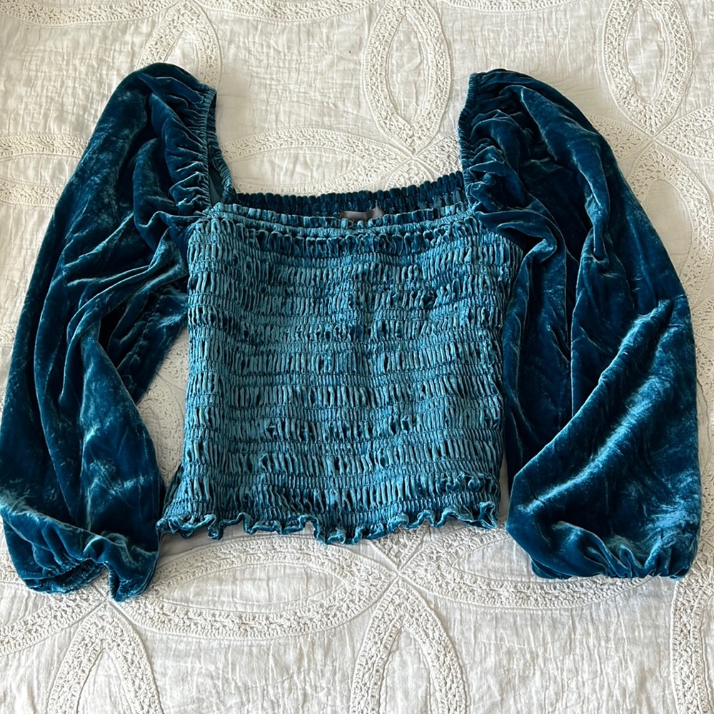Anthropologie women’s velvet top.